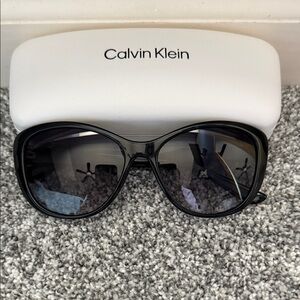 Calvin Klein Glossy Black Sunglasses
